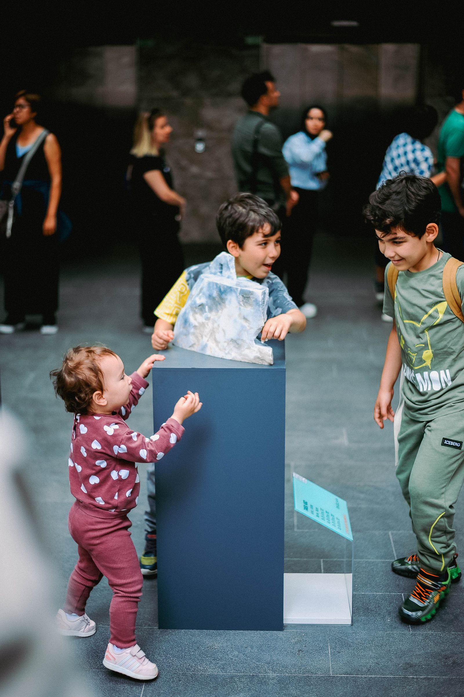 Children exploring an indoor museum exhibit